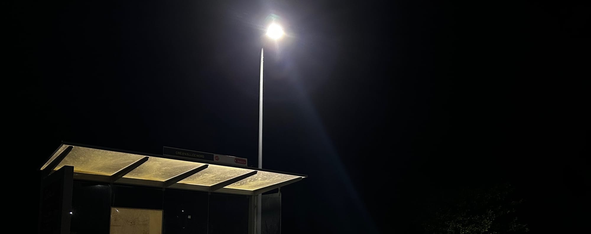 Bus stop at nigh